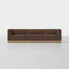 A modern brown three-seat sofa with blocky cushions and a light wood base, placed on a plain white floor against a white background.
