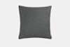 A rectangular, dark gray pillow with a soft, felt-like texture, displayed on a plain white background.