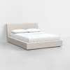 A modern bed with a beige upholstered frame and headboard, neatly made with white sheets and two white pillows, set in a minimalistic room with white walls and floor.