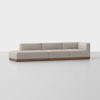 A modern beige sectional sofa with clean lines, low backrest, and a wooden base, positioned on a light gray floor against a plain white background.