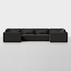 A modern, dark gray modular sectional sofa with three seats and corner pieces, arranged in a U-shape, set against a plain white background.