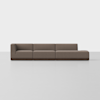 A modern, brown, L-shaped sectional sofa with clean lines, low backrests, and a minimalist design sits on a light gray floor against a plain white background.