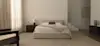 A minimalist bedroom with a beige upholstered bed, a light blanket, and a brown cushion. There are two wooden nightstands with decor, a beige armchair, large curtains, and modern art on the wall. Neutral tones fill the space.