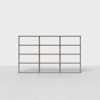 A minimalist, light wood bookcase with twelve open square shelves arranged in a 4x3 grid, standing on a smooth, light-colored floor against a plain white background.