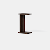 A modern, dark brown wooden side table shaped like an open C with a flat top, vertical support, and flat base, set against a plain white background.