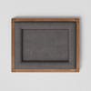 A rectangular, wooden-framed object with a padded, dark gray fabric interior, viewed from above against a plain white background.