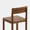 A simple wooden chair with a flat seat, straight backrest, and square legs, shown against a plain white background. The chair has a minimalist design and a natural wood finish.