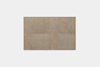 A square arrangement of six beige tiles with varying textures, placed against a plain white background.