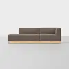 A modern brown sectional sofa with a left chaise, low wooden base, and clean lines, set against a plain white background.
