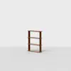 A small, minimalist wooden bookshelf with four shelves stands alone on a light gray floor against a plain white background.