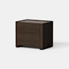 A modern, dark wood nightstand with clean lines and two drawers, set against a plain white background.