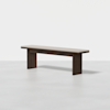 A modern wooden bench with a flat seat and two wide legs, set against a plain white background. The bench has a minimalist design and a dark brown finish.