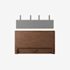 A rectangular wooden headboard with a smooth finish, shown below a gray fabric wall-mounted cushion panel with four metal brackets, against a plain white background.