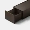 A dark wooden drawer is partially open, revealing its empty interior. The drawer is attached to a matching wooden cabinet against a plain white background.