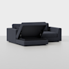 A modern dark gray sectional sofa with one seat lifted to reveal a hidden storage compartment beneath, set against a plain light background.