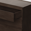 A close-up of a dark wooden dresser with one drawer partially open, showing its modern, minimalistic design and smooth finish.