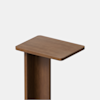 A wooden pedestal with a rectangular top and smooth edges, photographed against a plain white background.