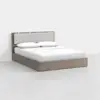 A modern platform bed with a light wood frame, upholstered headboard, and white bedding with two pillows, set against a plain white background.