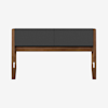 A modern bench with a dark gray cushioned seat and a wooden frame, viewed from the front against a plain white background.