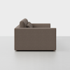 A couch on a white surface.