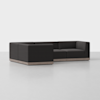 A modern, dark gray modular sectional sofa with low square arms and a wooden base, arranged in an L-shape on a light gray floor against a plain white background.