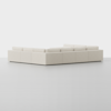 A large, modern beige sectional sofa with clean lines, arranged in a L-shape on a smooth, light gray floor against a plain white background.