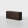 A modern, dark brown wooden dresser with six drawers, positioned against a plain white background.