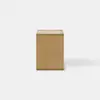 A modern wooden nightstand with a minimalist cube design, featuring an open shelf at the bottom and a single drawer that is partially pulled out. The nightstand sits on a plain, light-colored floor against a white background.
