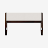 A modern bench with a dark wooden frame and a rectangular upholstered seat in a light beige fabric, shown against a plain white background.
