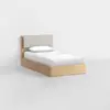 A single wooden bed with a light wood frame, cushioned gray headboard, and white bedding is positioned against a plain white wall and floor in a minimalistic room.