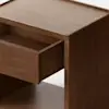 A modern wooden nightstand with a single drawer partially open, viewed from the side, set against a plain white background.