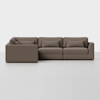 A modern brown L-shaped sectional sofa with three seat cushions and three back cushions, set against a plain white background. The design is minimalist and contemporary.
