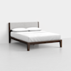 A modern bed with a dark wooden frame, angled legs, a light upholstered headboard, white bedding, and two pillows, set against a plain white wall and floor.