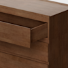 A close-up view of a modern wooden dresser with a drawer partially open, showing the smooth brown wood grain and clean, minimalist design.