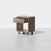 A modern wooden nightstand with a rectangular open shelf at the bottom and a single drawer at the top, shown partially open. The nightstand stands on four short cylindrical legs against a plain background.