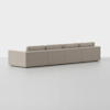 A modern, light beige sectional sofa with clean lines and low backrests is shown from the rear, set against a plain white background.