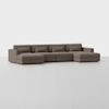 A large, modern sectional sofa upholstered in brown fabric, featuring three seat sections, a chaise lounge on the left, and an extended ottoman-style section on the right, set against a plain white background.