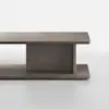 A modern, minimalist wooden coffee table with a rectangular top, a central vertical support, and a flat base, set against a plain white background.