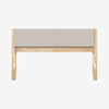 A modern wooden bench with light beige upholstered cushion and simple, clean lines, set against a plain white background.