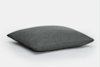 A dark gray, rectangular pillow with a smooth fabric surface is shown against a plain white background.