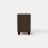 A dark wooden nightstand with a single open drawer and an open shelf below, standing on four short legs against a plain white background.