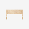 A light-colored wooden headboard with a simple, slatted design and two sturdy legs, photographed against a plain white background.
