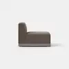 A brown armless sofa chair with a straight backrest and wooden base, shown from the side against a plain white background.