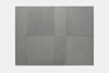 A square arrangement of six gray carpet tiles, each with a slightly different texture, forming a simple grid pattern on a white background.
