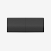 A rectangular, black, fabric-covered ottoman with a subtle textured pattern, shown against a plain white background.