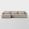 A modern, light beige sectional sofa with three seat cushions, three back cushions, three rectangular lumbar pillows, and a chaise lounge on the left side, set against a plain white background.