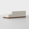 A modern, minimalist beige sectional sofa with clean lines and a low wooden base, set against a plain light background. The sofa has one arm and backrest at different heights.
