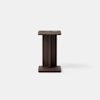 A modern, square side table with a dark wood base and a marble top, photographed against a plain white background.