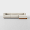 A modern sectional sofa with light beige upholstery and a wooden base, featuring three seats and a right-side chaise lounge, set against a plain white background.