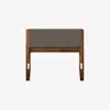 A modern wooden chair with a padded, gray upholstered backrest and seat. The chair has a minimalist design with straight wooden legs and a rectangular frame, set against a plain white background.